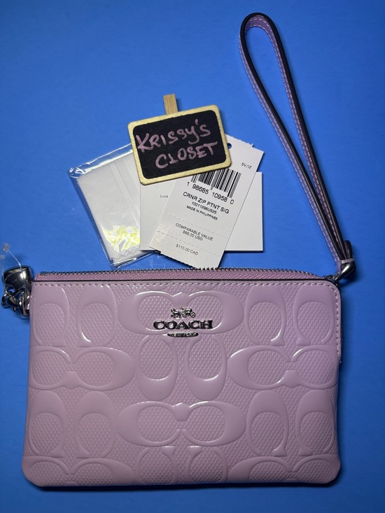 Coach Handbags - NWT COACH Light Violet Patent Signature Wristlet with Logo Plaque